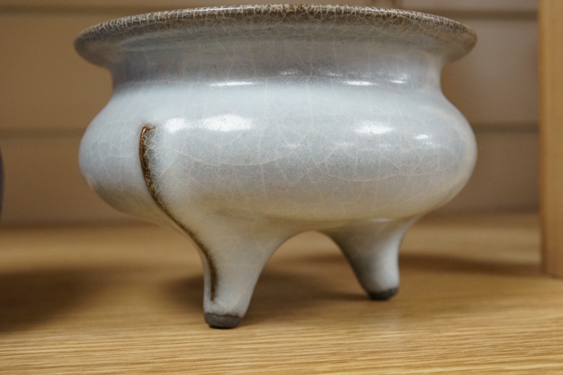 A Chinese crackle glaze tripod censer and powder blue jug, 14cm